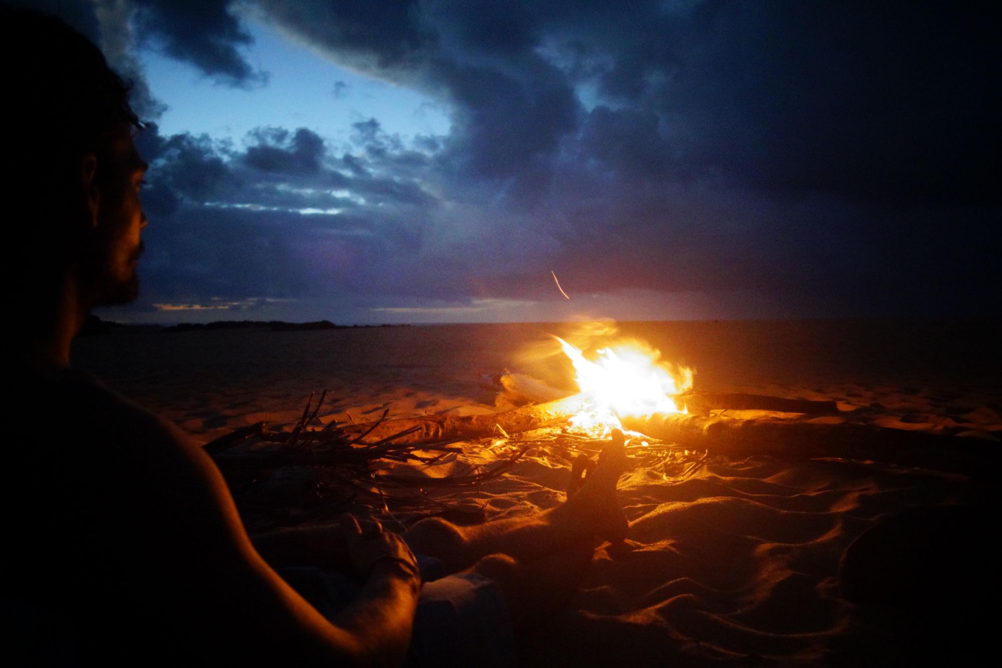 campfire sunset secret beach Kauai